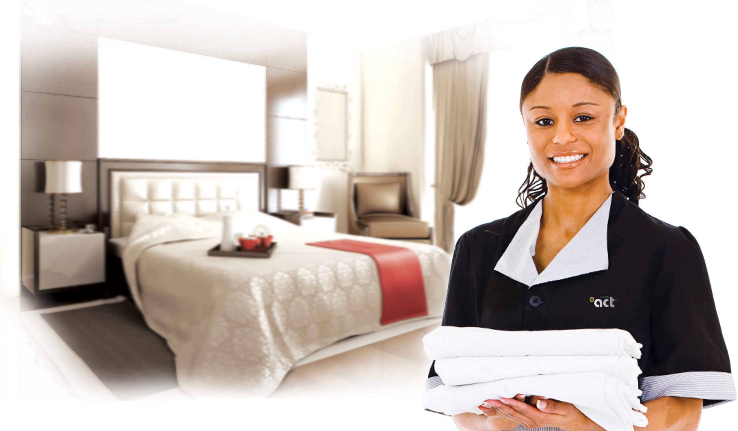 Beautiful hotel room with a beautiful woman smiling holding a wite towel