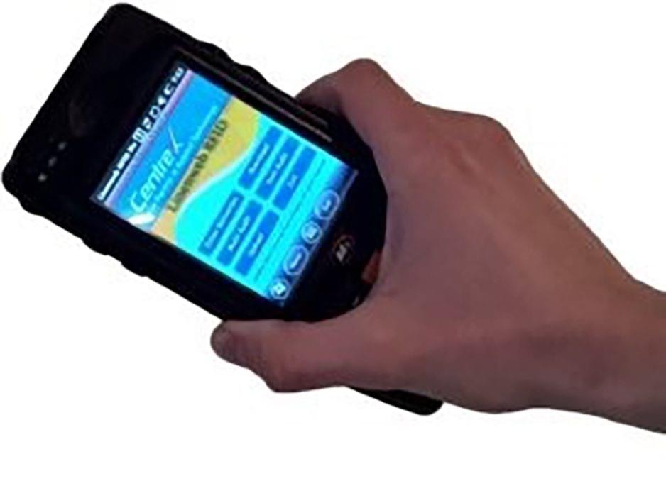 Hand holding a RFID scanner